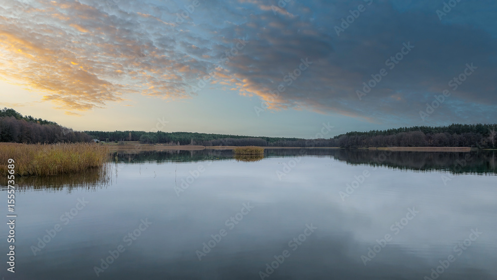 Fototapeta premium sunset at coast of the lake. Nature landscape. Nature in northern Europe.