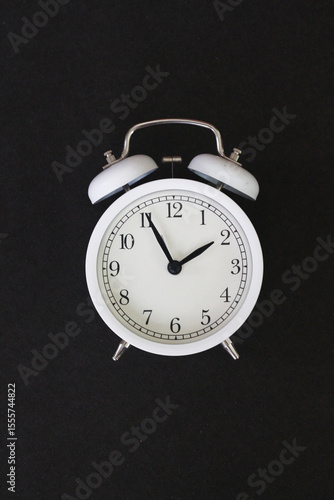 Wallpaper Mural Classic White Alarm Clock Isolated Against a Black Background Torontodigital.ca