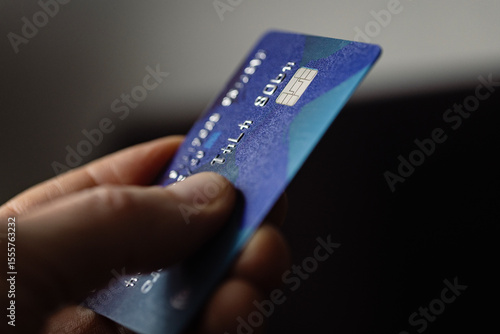 Hand holding credit card