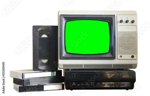 Old black vintage television with green screen and VCR from 1980s, 1990s, 2000s isolated on green background.