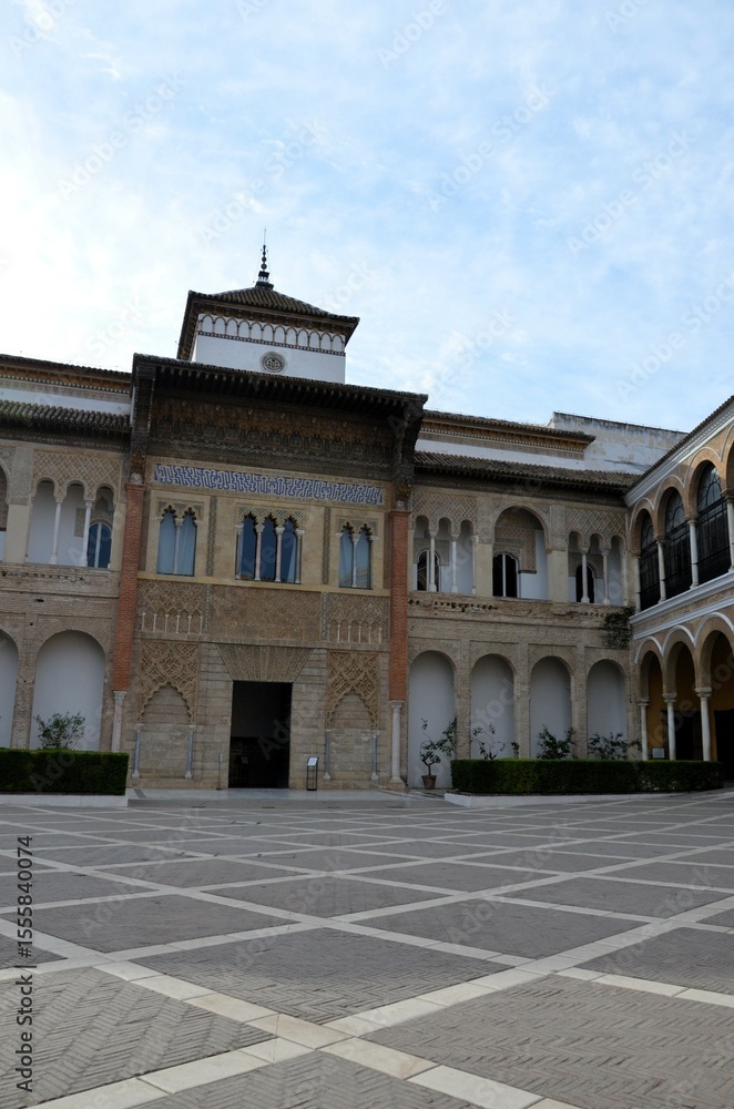 Fototapeta premium View of King Peter of Castile Palace from the Patio de la Monteria, Alcazar of Seville, Spain