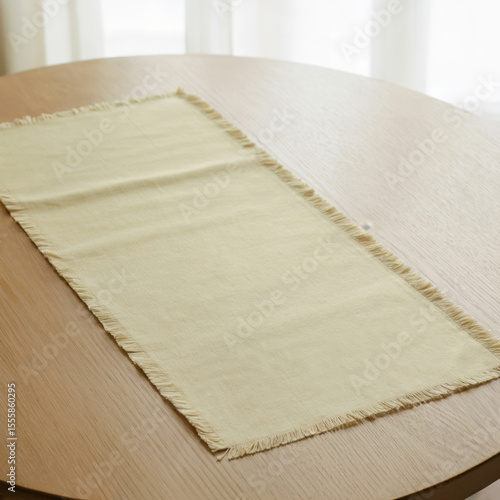 Elegant white linen table runner mockup. Blank natural tablerunner template. Long cloth table runner flat lays on wooden table
