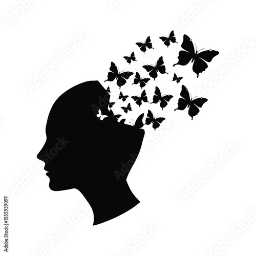 Creative silhouette of a human head with butterflies emerging symbolizing freedom transformation and new beginnings
