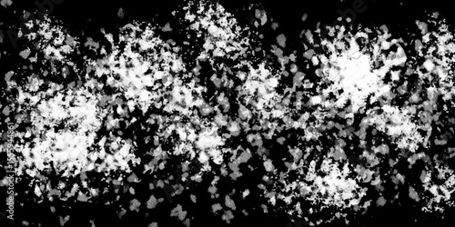 Snowflakes on dark background. white icy snowflakes isolated on black background, natural background. white crystalline powder on a black background. sugar dust. texture, pattern and clipping.