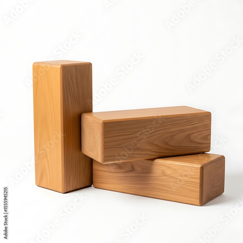 Stacked light beige wooden yoga blocks