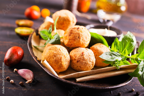 Overhead image of arabic snack falafel in the form of chickpea balls with spices.