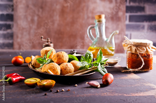 Overhead image of arabic snack falafel in the form of chickpea balls with spices.