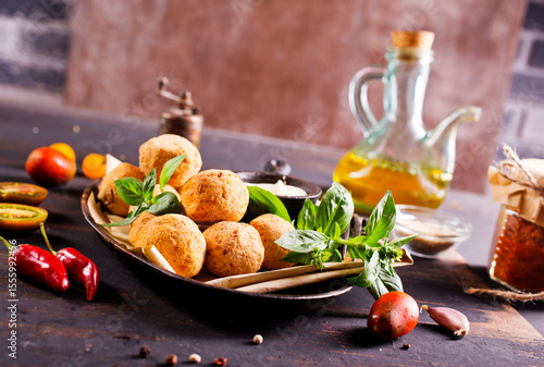 Overhead image of arabic snack falafel in the form of chickpea balls with spices.