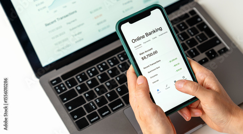 Closeup person using online banking mobile app.