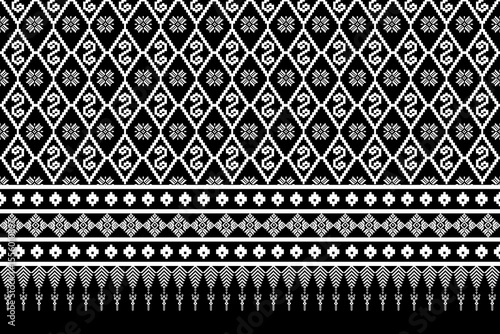 Traditional Black and White Woven Textile with Geometric and Floral Motifs