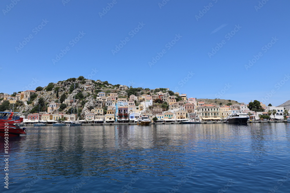 Obraz premium Iconic Greek Island Architecture – Aerial Photo of Symi, Dodecanese, Greece