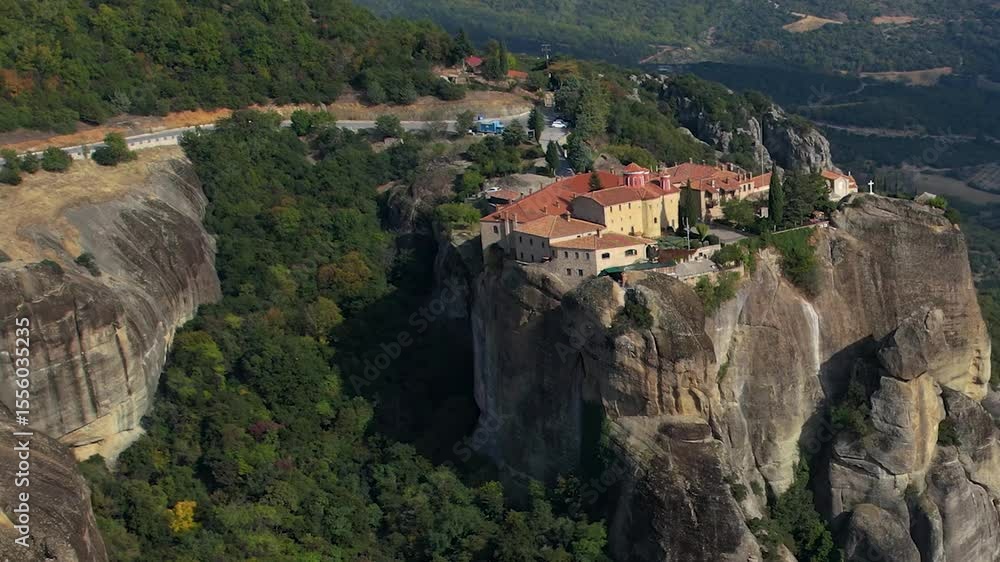 Aerial view around the city and monastery Meteora, Kalabaka, Monastère on a sunny day in Greece Aerial view around the city and monastery Meteora, Kalabaka, Monastère on a sunny day in Greece