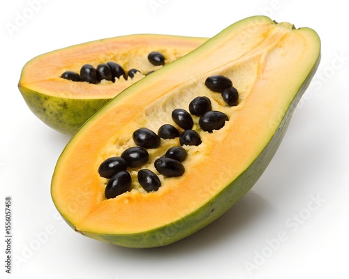 Half cut ackee fruit showing inside seeds white background
