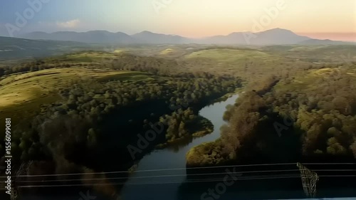 Futuristic High-Speed Train Journey Across Lush Landscapes and Mountain Views