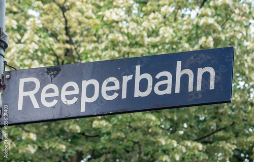 Reeperbahn street sign in Hamburg, Germany. The Reeperbahn is a street and entertainment district in St. Pauli district,  and also the major red-light district of Hamburg.