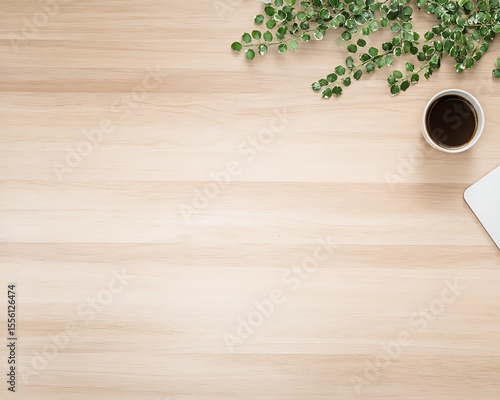 Minimalist workspace with coffee and plant