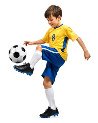 Young boy soccer player in yellow jersey doing a ball control on isolated background