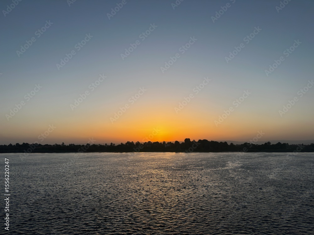 Naklejka premium sunset on the river