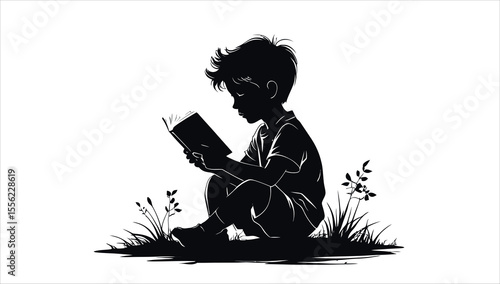 A Silhouette of a boy reading a book