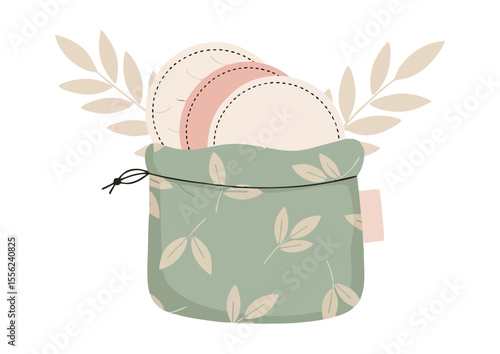 Reusable cotton pads in a leaf-patterned pouch for sustainable beauty care