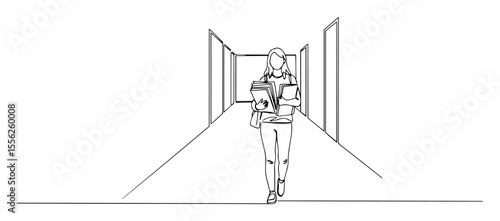 student walking in hallway with books