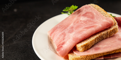Sandwich ham slices meat spam pork fresh delicious gourmet food background on the table rustic food top view copy space