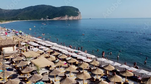 aerial view of the beach with bathers in the water, Adriatic see, Montenegro beach Buljarice