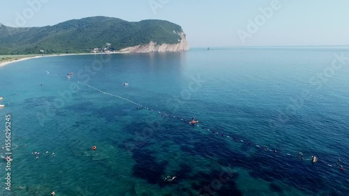 aerial view of the beach with bathers in the water, Adriatic see, Montenegro beach Buljarice