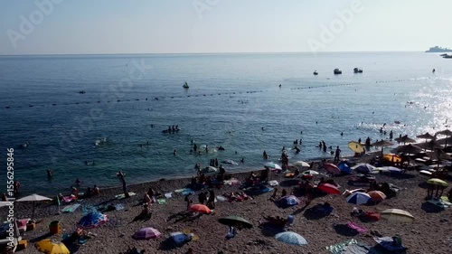 aerial view of the beach with bathers in the water, Adriatic see, Montenegro beach Buljarice