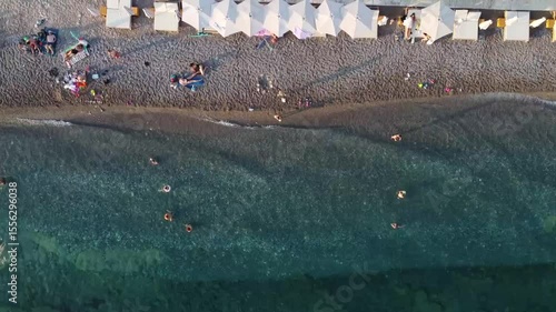 aerial view of the beach with bathers in the water, Adriatic see, Montenegro beach Buljarice