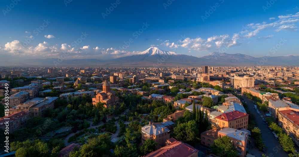 Fototapeta premium A photo of city with red-roofed houses and the large, white Mount Ararat in the background, with some trees, 