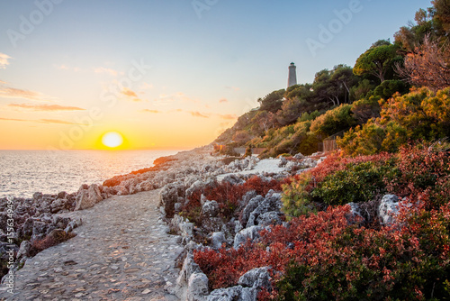 Fotografie Lighthouse of the Cap Ferrat at winter sunset just outside of Nice, France
