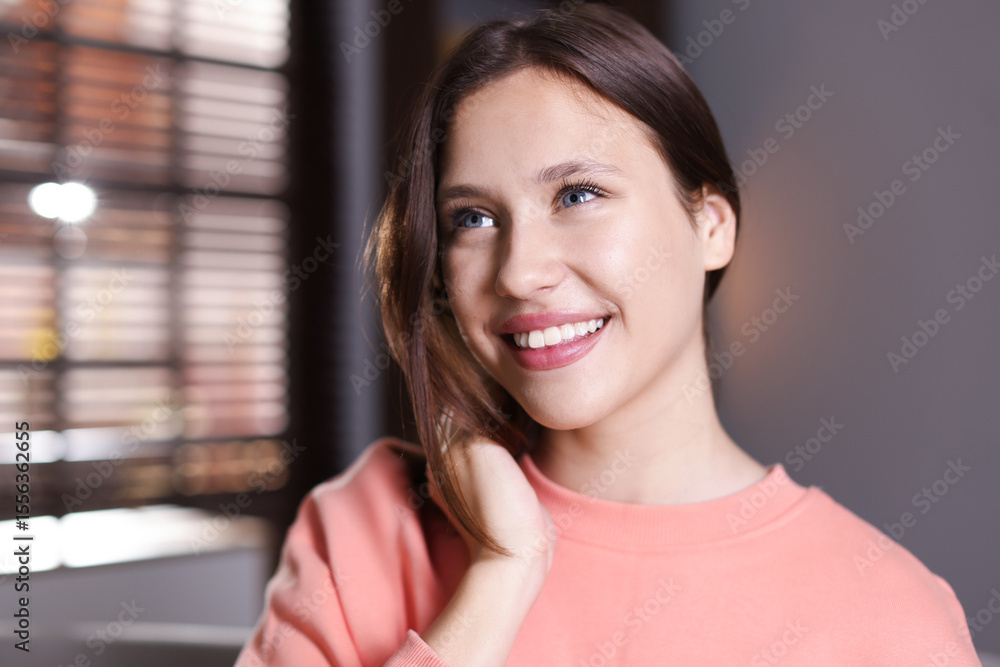 Portrait of smiling teenage girl at home Portrait of smiling teenage girl at home