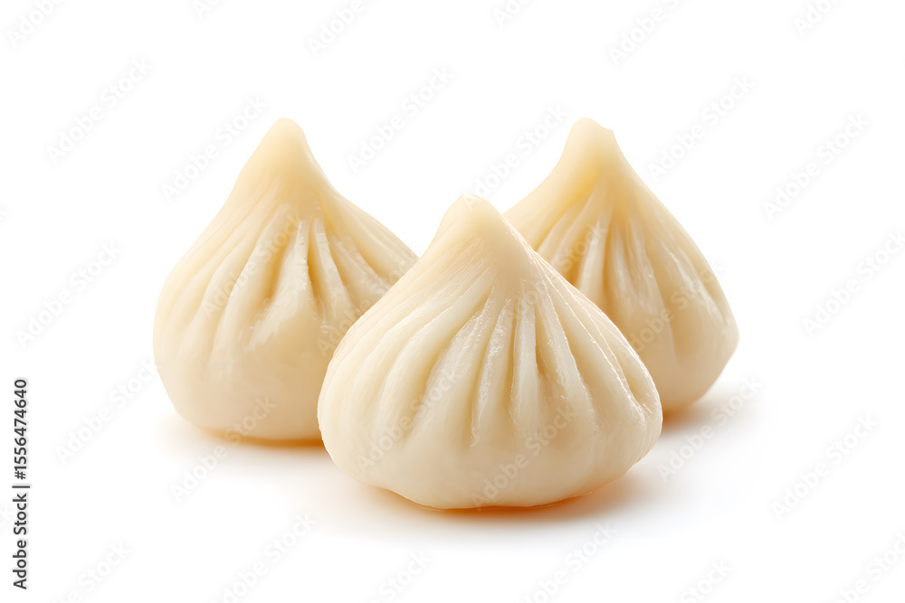 Obraz premium Steamy Indian modak dumpling on white. Fresh traditional modak with visible steam and rich texture. Perfect for cultural, festive, or vegan food projects.