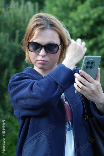 Close-up of a young woman with a phone31