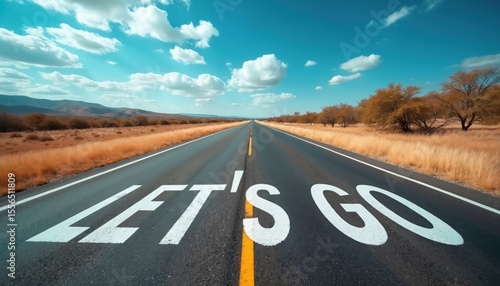 Wallpaper Mural Phrase Let Go painted on asphalt road, highway in middle of nowhere under blue sky. Journey start, business travel concept. Road trip, summer vacation, outdoor adventure, motivational quote. Torontodigital.ca