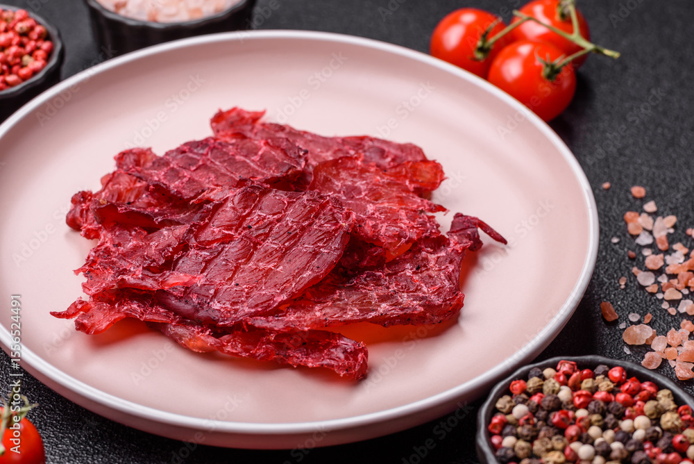 Jerky or dried chicken and cherry snacks. Dehydrated, dried snacks for beer Jerky or dried chicken and cherry snacks. Dehydrated, dried snacks for beer