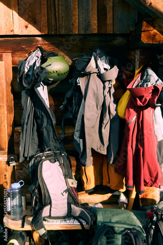 Hiking gear hanging at a mountain lodge in the Alps after a day of adventure on the trails
