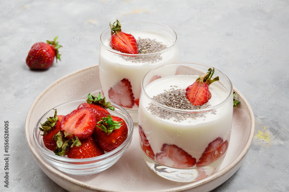 Layered Yogurt Dessert With Chia And Strawberries In Glass Layered Yogurt Dessert With Chia And Strawberries In Glass