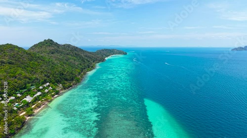 Flight along Phi Phi Don Island. Turquoise coast, popular Thai islands in Krabi province.