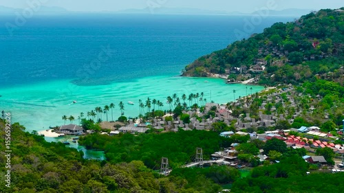 Luxury hotel on the coast of Phi Phi island. Turquoise lagoon on the shore, view from a great height on the coast of popular Thai islands.