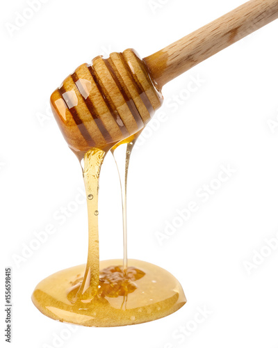 Honey dripping from wooden dipper isolated on transparent background