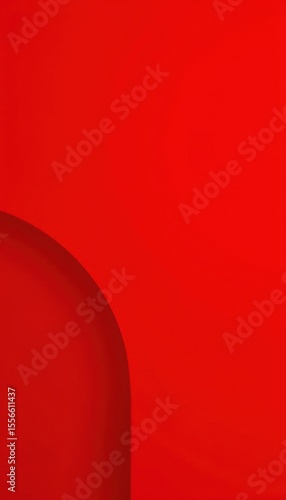 A red background with a curved corner in the middle.