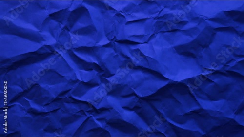  top view on multicolor color crumpled paper, texture background. Stop motion animation loop