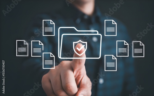 Person s finger touching a digital folder icon with a shield and checkmark surrounded by document icons on a dark background