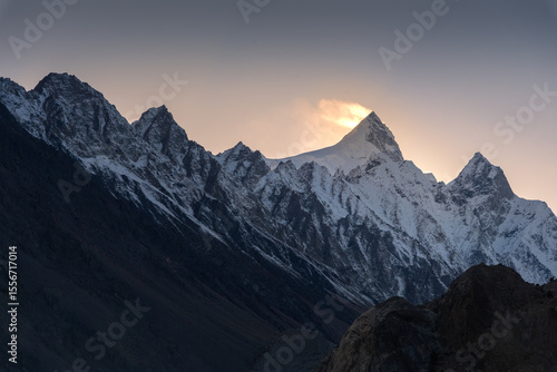 Wallpaper Mural Snow-Covered Shispare Peak at Sunset, Majestic Mountain Silhouette Torontodigital.ca