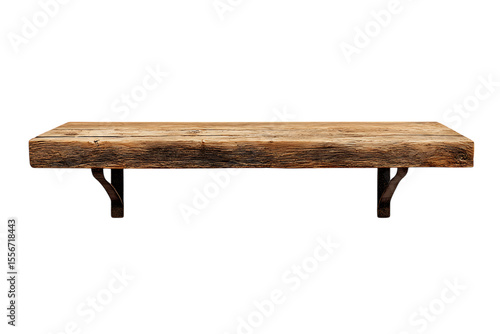 Long wooden shelf with metal brackets, isolated on black background.