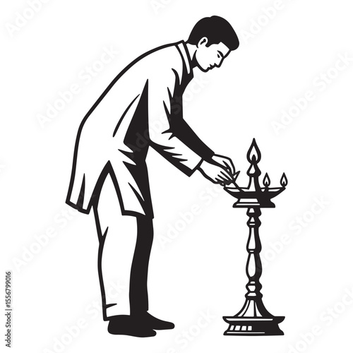 Man lighting diya lamp celebrating traditional indian hindu festival or ritual