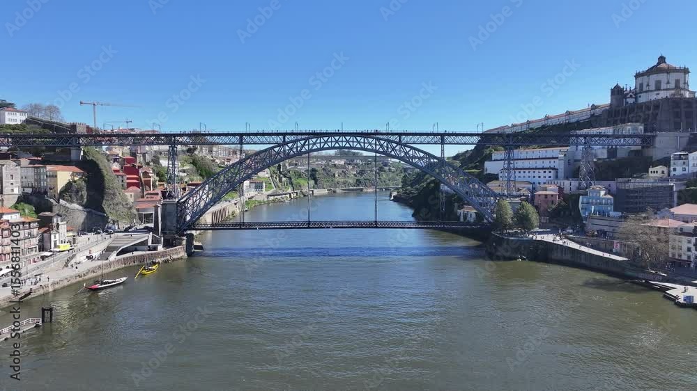 Luis I Bridge In Porto Portugal. Bridge Showcasing The Traffic Flowing Across In The City. Shore Sky Clouds Beach Sea. Outdoor Beach Panoramic. Porto Portugal. Luis I Bridge In Porto Portugal. Bridge Showcasing The Traffic Flowing Across In The City. Shore Sky Clouds Beach Sea. Outdoor Beach Panoramic. Porto Portugal.