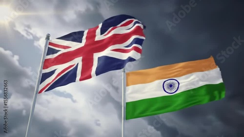 UK and India Flags Wave Against Stormy Sky